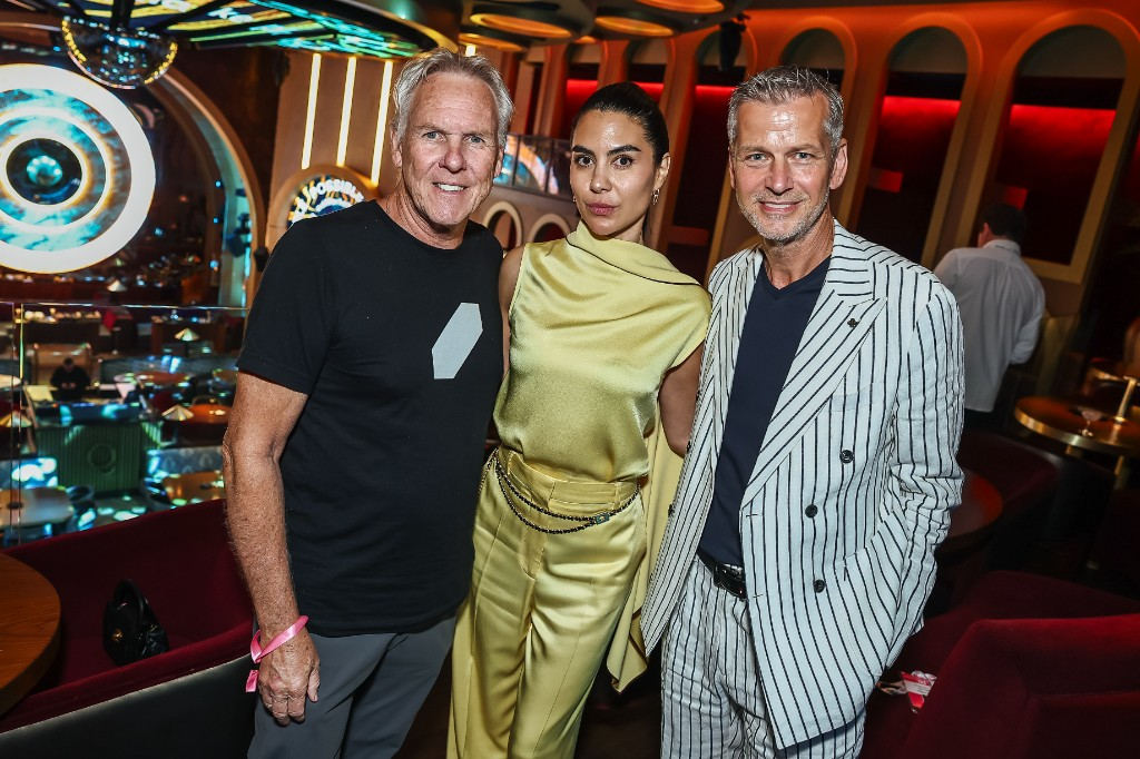 VIP guests posing in a lounge